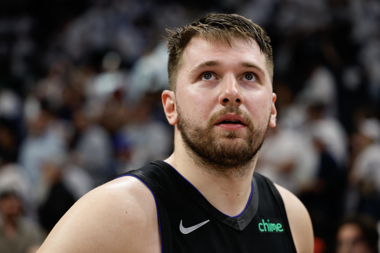 Luka Dončić was listed as questionable hours before Sunday's Game 3 against the Timberwolves. (David Berding/Getty Images)