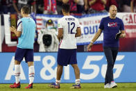 United States head coach Gregg Berhalter, right, leaves the pitch following a 1-1 draw against Canada in a World Cup soccer qualifier Sunday, Sept. 5, 2021, in Nashville, Tenn. (AP Photo/Mark Humphrey)