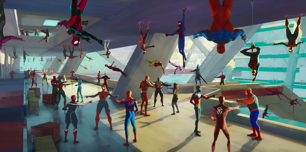 a room full of spidermans point fingers at each other in a scene from spiderman across the spiderverse,