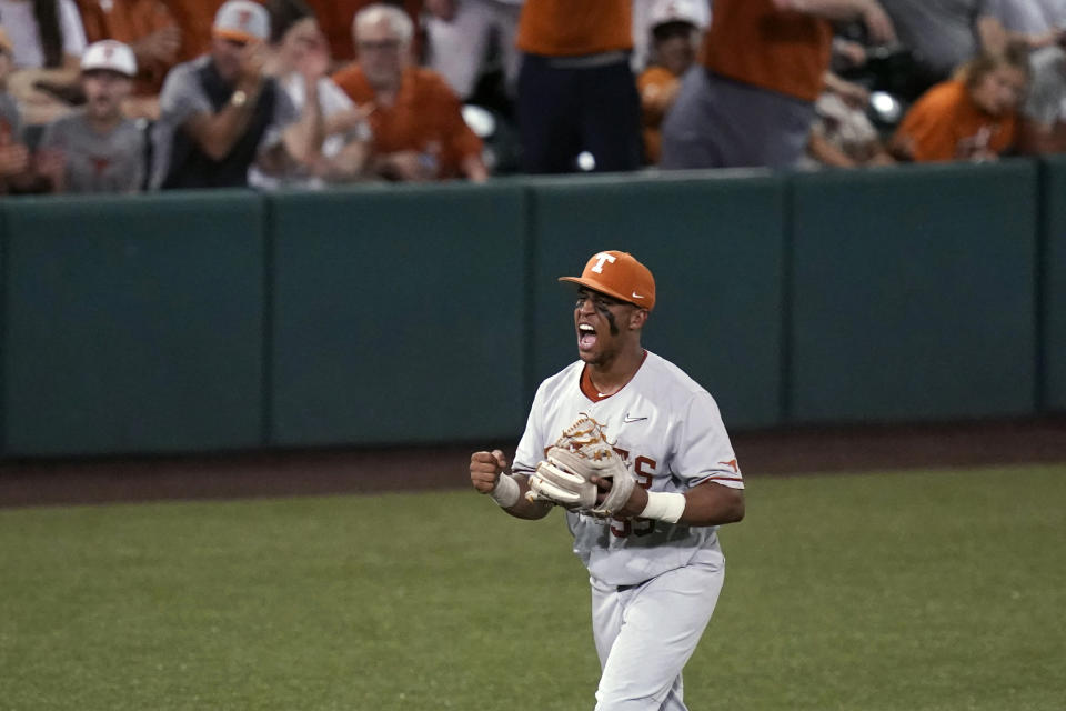 Texas' Camryn Williams reacts after an out against South Florida during the fourth inning of an NCAA Super Regional college baseball game, Sunday, June 13, 2021, in Austin, Texas. (AP Photo/Eric Gay)