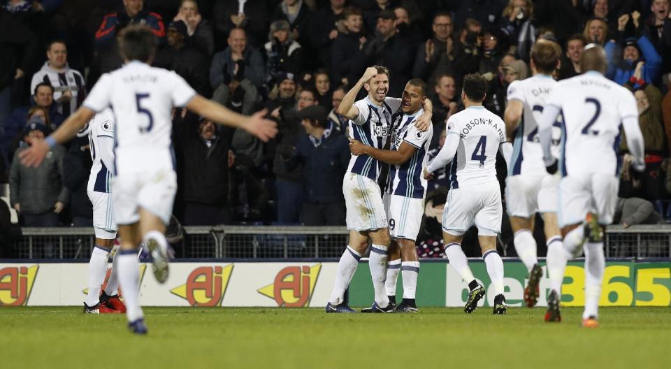 <p>Britain Football Soccer – West Bromwich Albion v Hull City – Premier League – The Hawthorns – 2/1/17 West Bromwich Albion’s Gareth McAuley celebrates scoring their second goal with team mates Reuters / Darren Staples Livepic EDITORIAL USE ONLY. No use with unauthorized audio, video, data, fixture lists, club/league logos or “live” services. Online in-match use limited to 45 images, no video emulation. No use in betting, games or single club/league/player publications. Please contact your account representative for further details. </p>