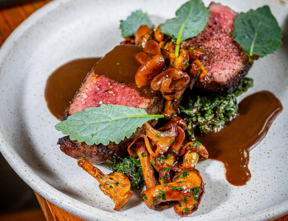 <div class="cell medium-auto caption">Sirloin with kale and chanterelles</div> <div class="cell medium-shrink medium-text-right credit">Rey Lopez</div>