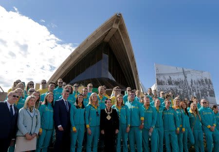 Sydney's Lord Mayor Clover Moore (C) poses for a picture with Australia's Olympic athletes returning from Rio during an official welcome ceremony at the Sydney Opera House in Australia, August 29, 2016. REUTERS/Jason Reed