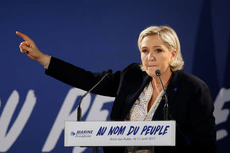 Marine Le Pen, French National Front (FN) political party leader and candidate for French 2017 presidential election, attends a political rally in Arcis-sur-Aube, near Troyes, France April 11, 2017. REUTERS/Benoit Tessier