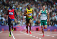 LONDON, ENGLAND - AUGUST 07: Yohan Blake of Jamaica leads Jaysuma Saidy Ndure of Norway and Paul Hession of Ireland in the Men's 200m Round 1 Heats on Day 11 of the London 2012 Olympic Games at Olympic Stadium on August 7, 2012 in London, England. (Photo by Stu Forster/Getty Images)