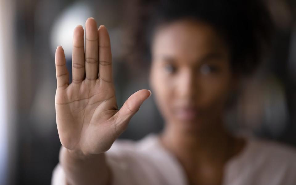 <span class="caption">Sexual harassment is a common workplace hazard for nonprofit fundraisers.</span> <span class="attribution"><a class="link " href="https://www.gettyimages.com/detail/photo/close-up-of-ethnic-woman-show-palm-demonstrate-royalty-free-image/1335240373" rel="nofollow noopener" target="_blank" data-ylk="slk:fizkes/iStock/Getty Images Plus;elm:context_link;itc:0;sec:content-canvas">fizkes/iStock/Getty Images Plus</a></span>