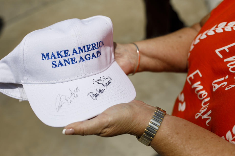 An attendee holds a hat that reads “Make America Sane Again” at a campaign event for Gavin Newsom on May 31, 2018, in Palm Springs, Calif. (Photo: Patrick T. Fallon for Yahoo News)