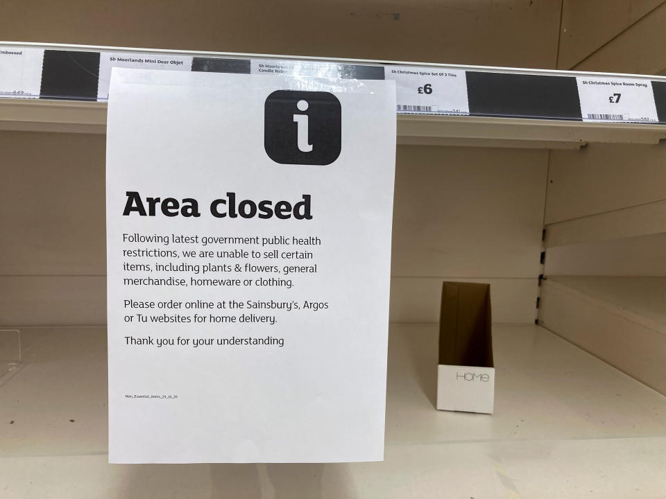 A view shows empty shelves in a supermarket during the first evening of the welsh lockdown, amid the coronavirus disease (COVID-19) outbreak, in Tenby, Wales, Britain October 23, 2020. REUTERS/Rebecca Naden