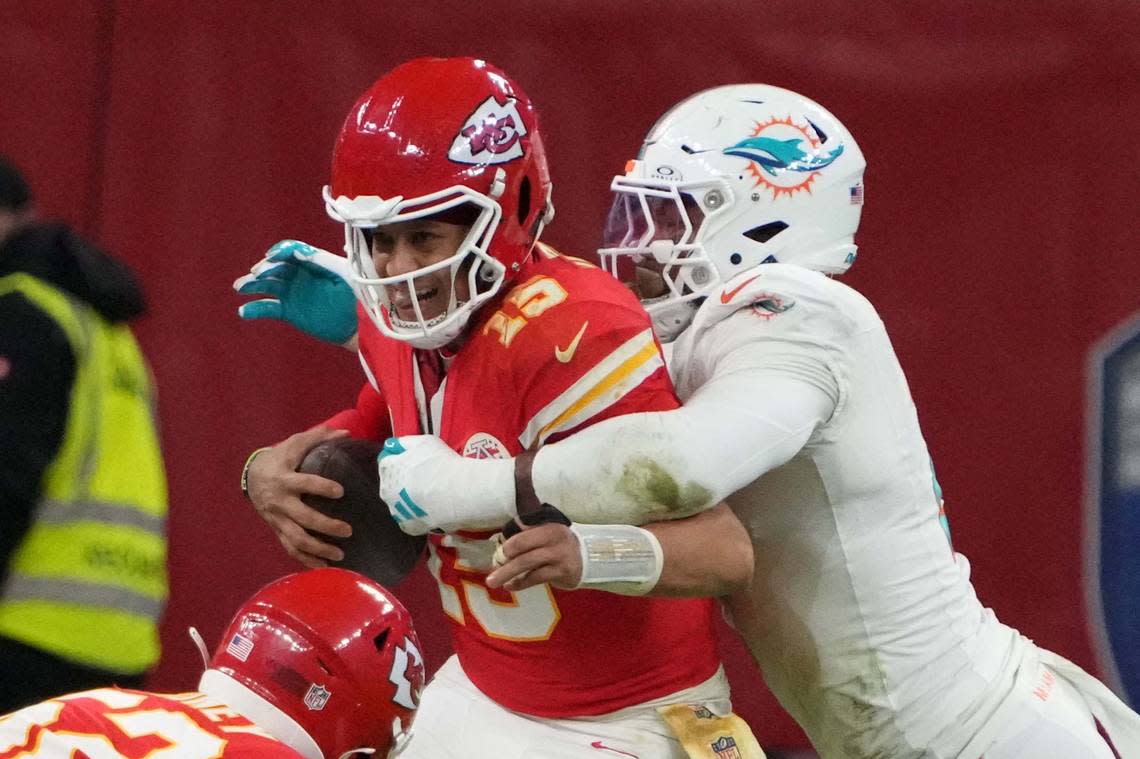 Nov 5, 2023; Frankfurt, Germany; Miami Dolphins linebacker Bradley Chubb (2) forces a fumble by Kansas City Chiefs quarterback Patrick Mahomes (15) in the second half during an NFL International Series game at Deutsche Bank Park. Mandatory Credit: Kirby Lee-USA TODAY Sports Kirby Lee/Kirby Lee-USA TODAY Sports