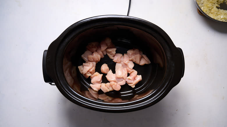 chicken pieces in a slow cooker