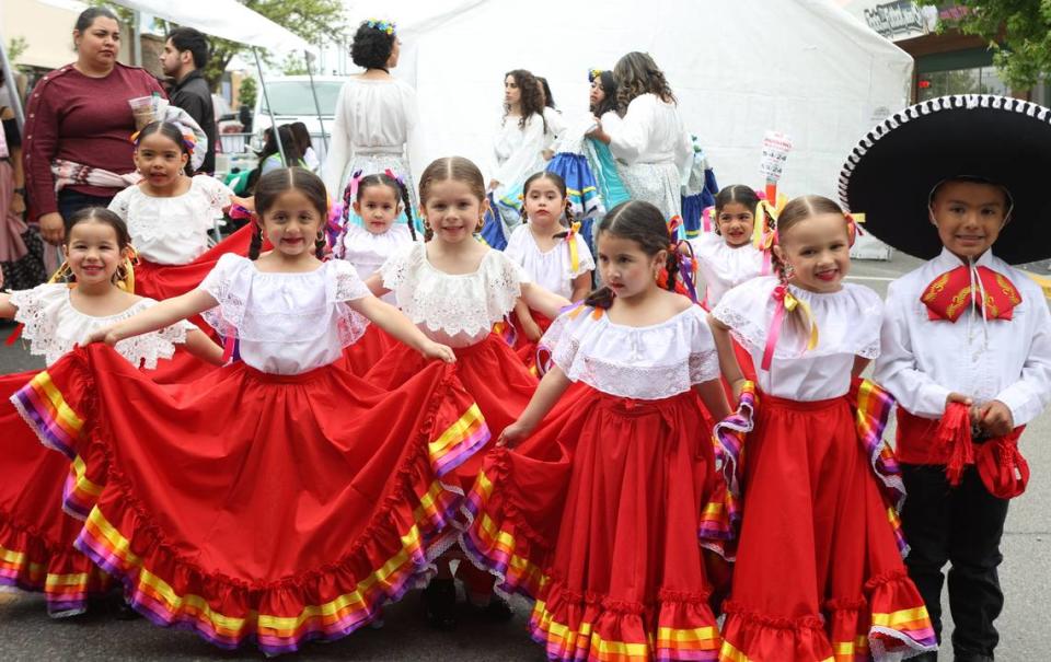 A group of the youngest dancers from Cielo de México waits backstage before performing at Pasco’s Cinco de Mayo on Saturday, May 4.
