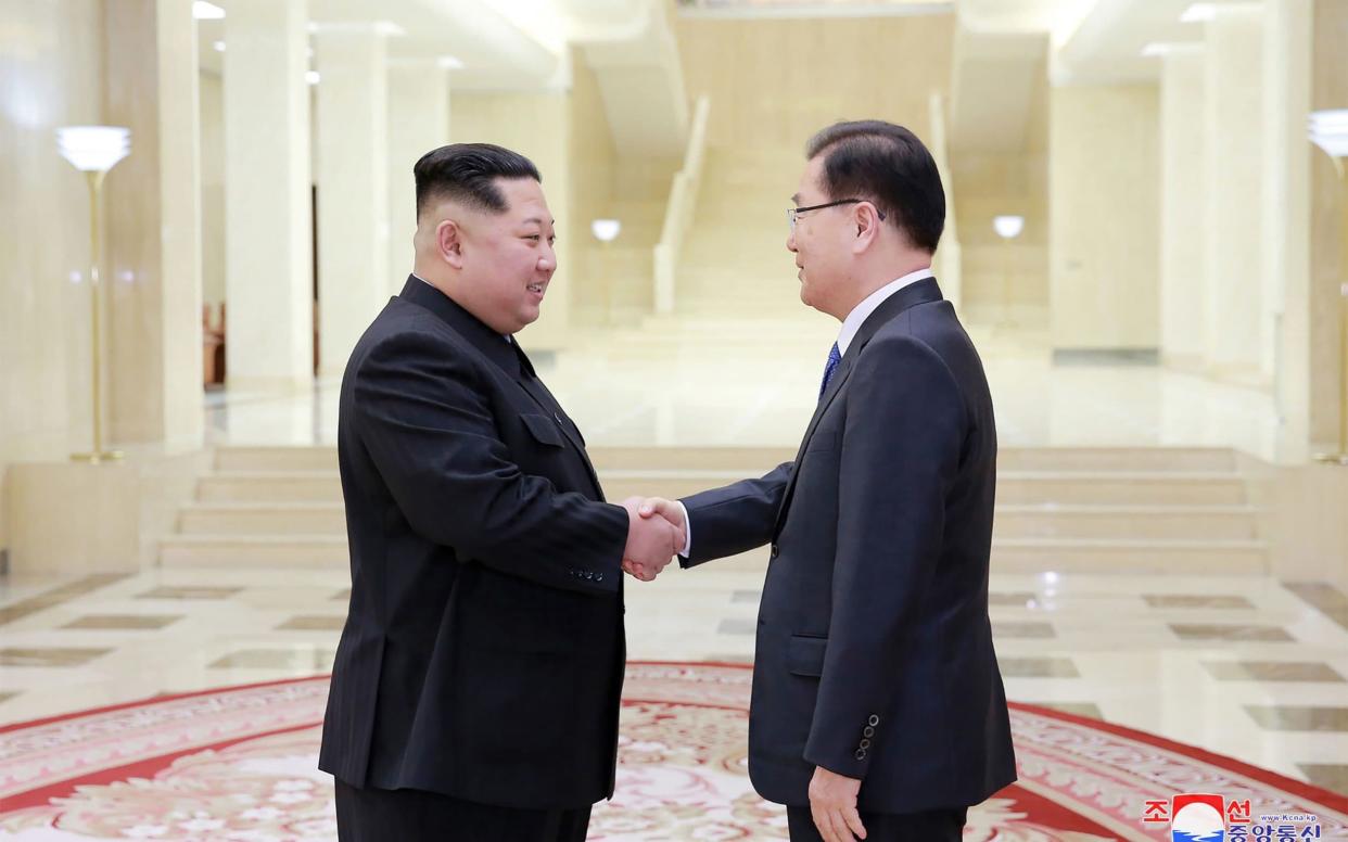 A senior delegation returned from a visit to the North where they met leader Kim Jong-un - AFP