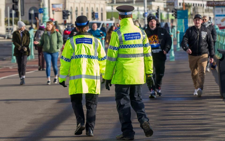 Two police community support officers patrol the seafront at Brighton on Sunday - David McHugh/Brighton Pictures