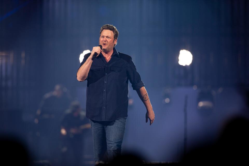 Country singer and television personality Blake Shelton performs his song “A Guy With a Girl” at the Heritage Bank Center in Dwntown Cincinnati during his Back to the Honkey Tonk Tour with Carly Pearce and Jackson Dean.