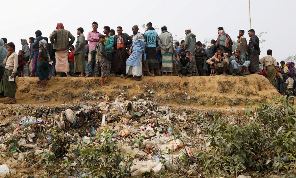 Rohingya refugees line up for food and water at Balukhali camp, near Cox’s Bazar, Bangladesh.