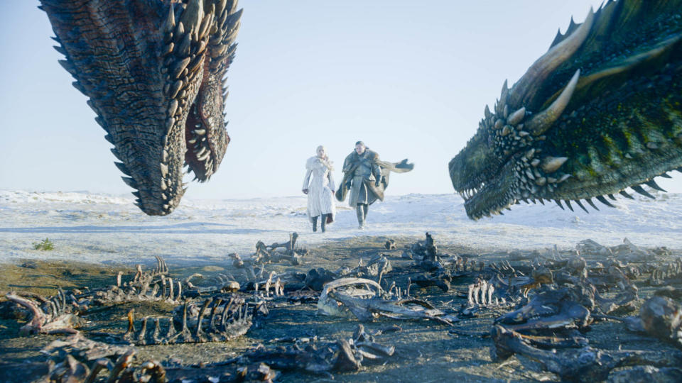 This image released by HBO shows Emilia Clarke, left, and Kit Harington in a scene from the final episode of "Game of Thrones." Although Kit Harington was nominated for a Golden Globe for best actor in a drama series, the final season of the series failed to get a nomination for best drama series. (HBO via AP)