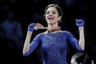 Figure Skating - ISU World Figure Skating Championships - Ladies Free Skate program - Boston, Massachusetts, United States - 02/04/16 - Evgenia Medvedeva of Russia celebrates with her gold medal on the awards podium. - REUTERS/Brian Snyder