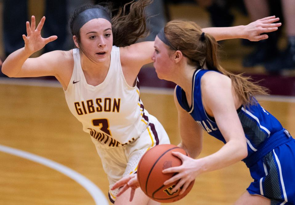 Gibson Southern's Ally Malone (3) guards Memorial’s Avery Kelley (32) during their Class 3A sectional championship game at Mount Vernon High School Monday night, Feb. 6, 2023.