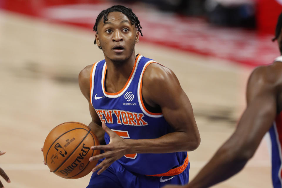 Feb 28, 2021; Detroit, Michigan, USA; New York Knicks guard Immanuel Quickley (5) drives to the basket against the Detroit Pistons during the second quarter at Little Caesars Arena. 