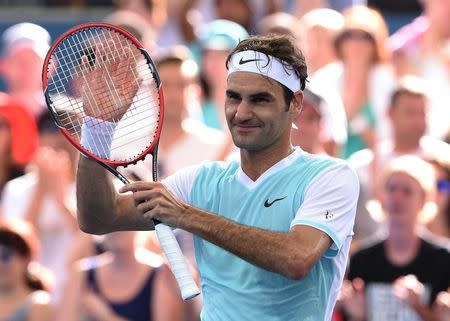 Roger Federer of Switzerland celebrates after defeating Dominic Thiem of Austria in their semi-final match at the Brisbane International Tennis Tournament in Brisbane, January 9, 2016. REUTERS/Dave Hunt/AAP