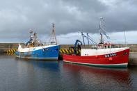 Fishing boats sit docked in Macduff, Aberdeenshire