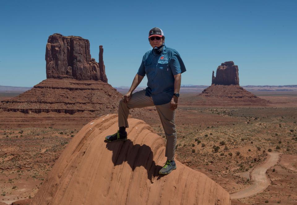 President of the Navajo Nation Jonathan Nez stands in the Monument Valley Tribal Park, which has been closed due to the Covid-19 pandemic in Arizona on May 21, 2020. - Weeks of delays in delivering vital coronavirus aid to Native American tribes exacerbated the outbreak, the president of the hard-hit Navajo Nation said, lashing the administration of President Donald Trump for botching its response. Jonathan Nez told AFP in an interview that of the $8 billion promised to US tribes in a $2.2 trillion stimulus package passed in late March, the first tranche was released just over a week ago. (Photo by Mark RALSTON / AFP) (Photo by MARK RALSTON/AFP via Getty Images)