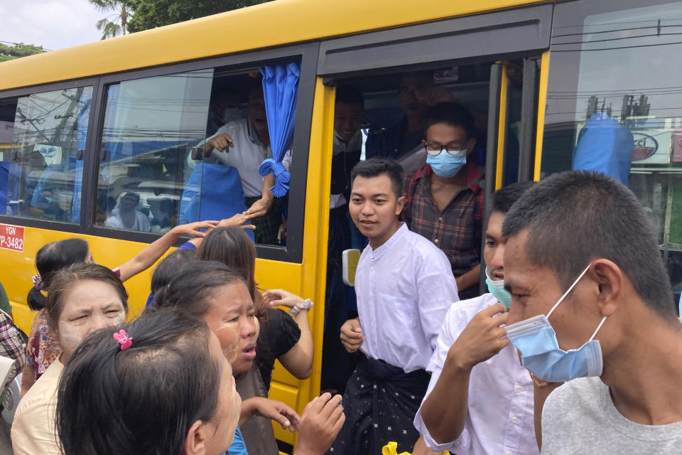 Released prisoners get off from a bus after they release from Insein Prison in Yangon, Myanmar Wednesday, May 3, 2023. Myanmar’s ruling military council says it is releasing more than 2,100 political prisoners as a humanitarian gesture. Thousands more remain imprisoned on charges generally involving nonviolent protests or criticism of military rule, which began when the army seized power in 2021. (AP Photo/Thein Zaw)