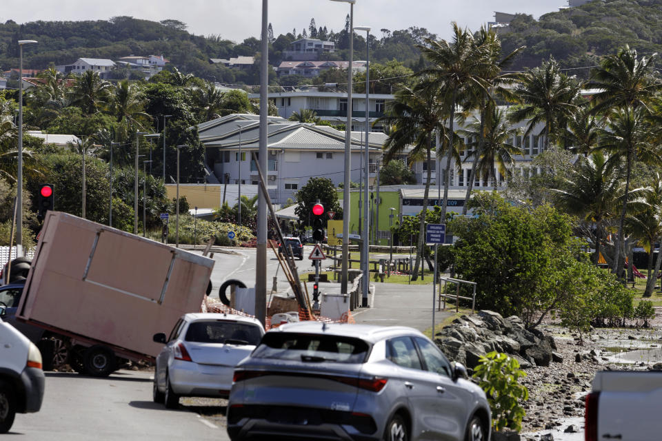 A blockade is pictured in Noumea, New Caledonia, Thursday May, 16, 2024. France has imposed a state of emergency in the French Pacific territory of New Caledonia. The measures imposed on Wednesday for at least 12 days boost security forces' powers to quell deadly unrest that has left four people dead, erupting after protests over voting reforms. (AP Photo/Cedric Jacquot)