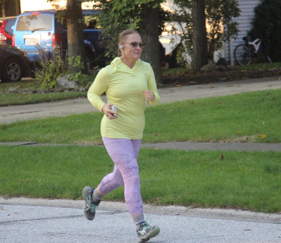 April Wells incorporates stretching into every run to prevent joint stiffness. (Photo: April Wells)