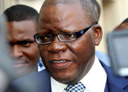 Lawyer Tendai Biti, former finance minister, speaks to journalits after a two-week ban on public protests issued by the police was struck down, outside Zimbabwe's High Court in the capital Harare, September 7, 2016. REUTERS/Philimon Bulawayo
