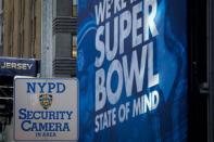 An NYPD Security camera sign is posted along Superbowl Blvd. ahead of Super Bowl XLVIII in New York January 29, 2014. REUTERS/Brendan McDermid