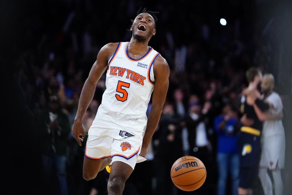 New York Knicks' Immanuel Quickley (5) celebrates after an NBA basketball game against the Indiana Pacers Monday, Nov. 15, 2021, in New York. The Knicks won 92-84.(AP Photo/Frank Franklin II)