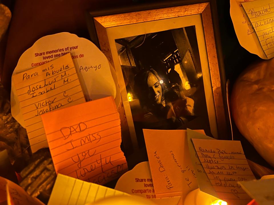 Candles, messages and "ofrendas," or offers, for loved ones are displayed at an altar at the Día de Los Muertos celebration at the Hollywood Forever Cemetery in Los Angeles on Saturday, Oct. 28, 2023.