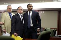 Former Las Vegas Raiders player Henry Ruggs, right, appears in court Wednesday, May 10, 2023, in Las Vegas. Ruggs plead guilty to driving his car drunk before causing a fiery crash that killed a woman. (AP Photo/John Locher)