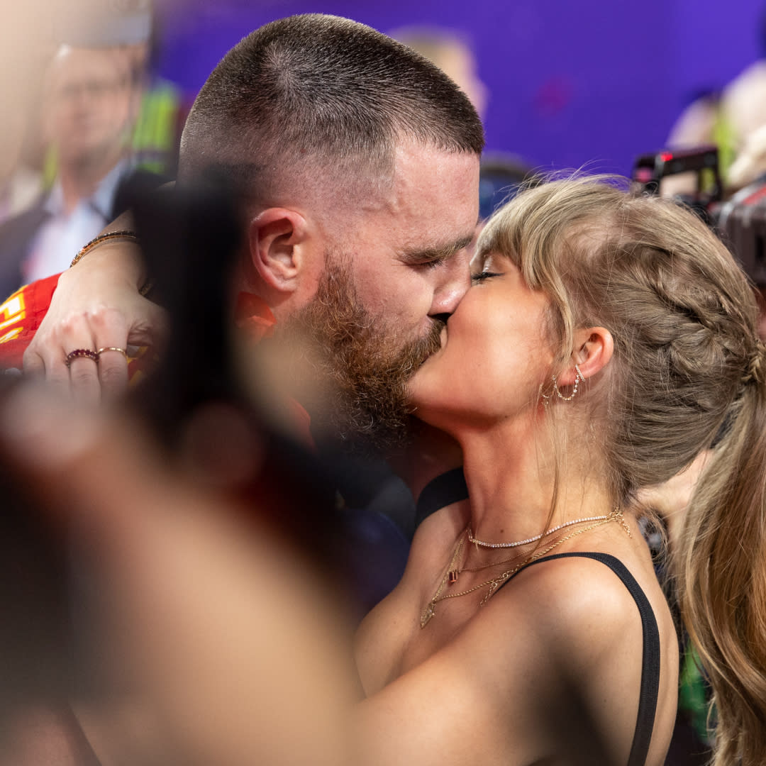  Travis Kelce #87 of the Kansas City Chiefs celebrates and kisses Singer Taylor Swift following the NFL Super Bowl 58 football game between the San Francisco 49ers and the Kansas City Chiefs at Allegiant Stadium on February 11, 2024 in Las Vegas, Nevada. 