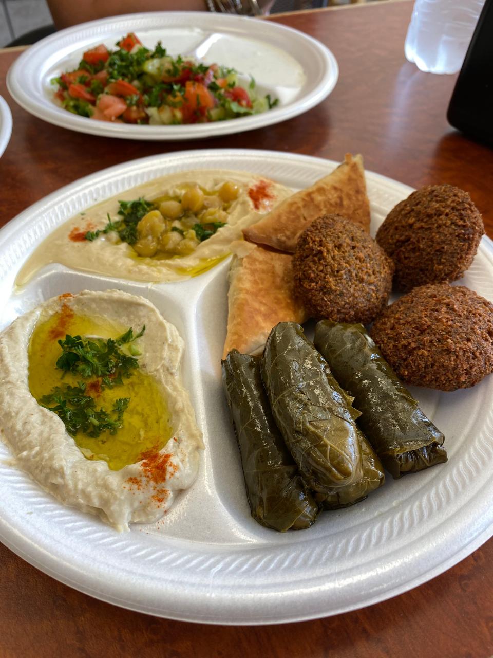 The Vegetable Deal at Castle Restaurant in Memphis, TN. This sampler plate comes with hummus, baba ganoush (eggplant dip), falafel, dolmades (stuffed grape leaves), spanakopita and pita bread.