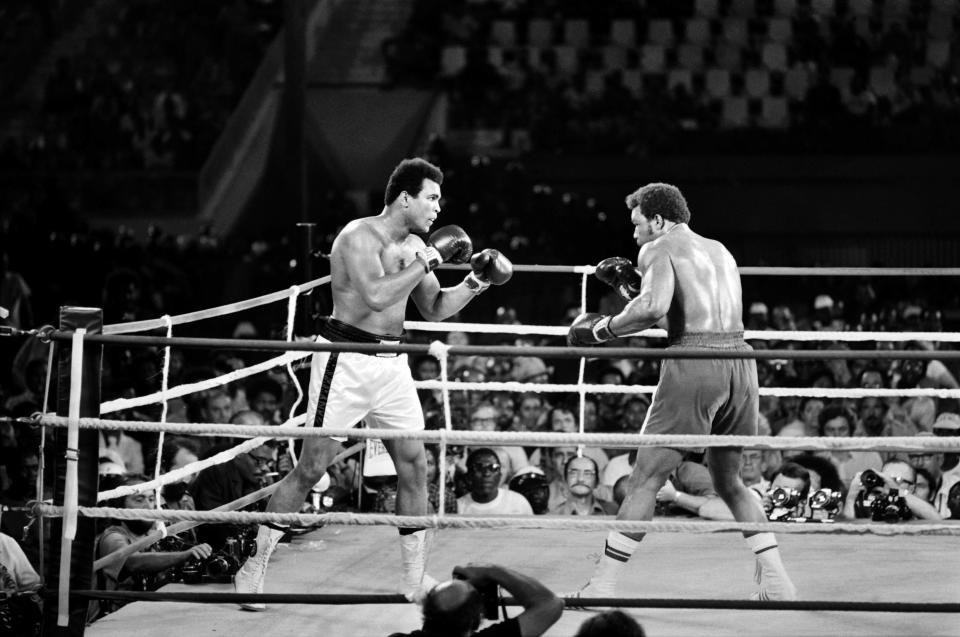 Items from Muhammad Ali's 1974 fight vs. George Foreman (right) in Kinshasa, Zaire are included in an auction.