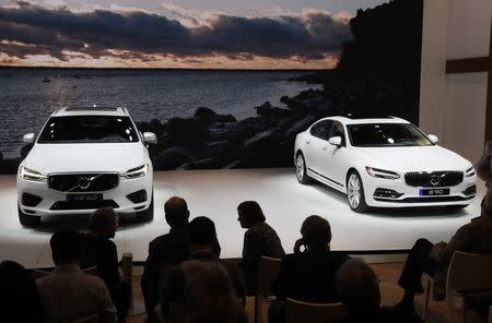 The The 2018 Volvo XC60 (L) and Volvo S90 are displayed at the 2017 New York International Auto Show in New York City, U.S. April 12, 2017. REUTERS/Lucas Jackson