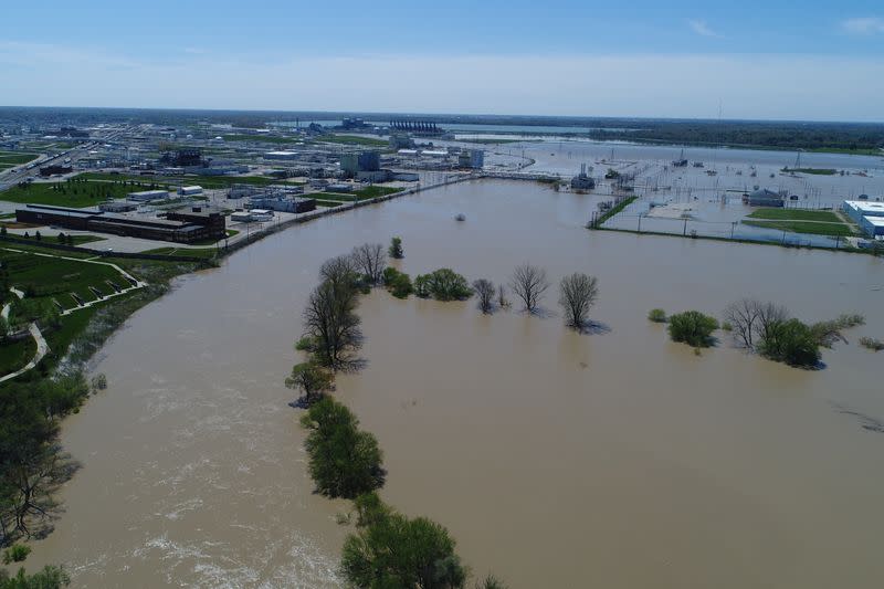 Rising flood waters of the Tittabawassee River advance upon the city after the breach of two dams in Midland