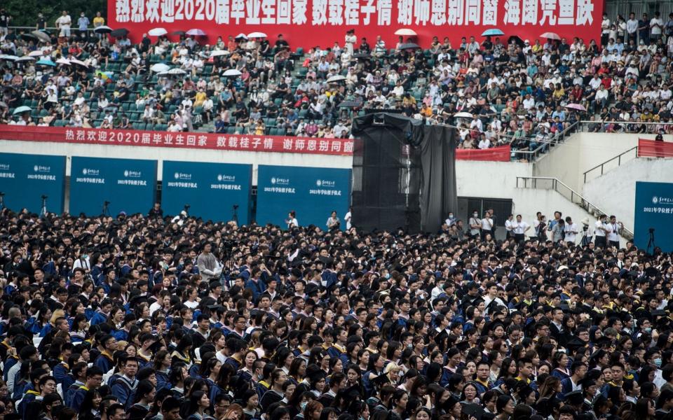 Thousands of graduates at Central China Normal University in Wuhan on June 13 2021 - STR/AFP