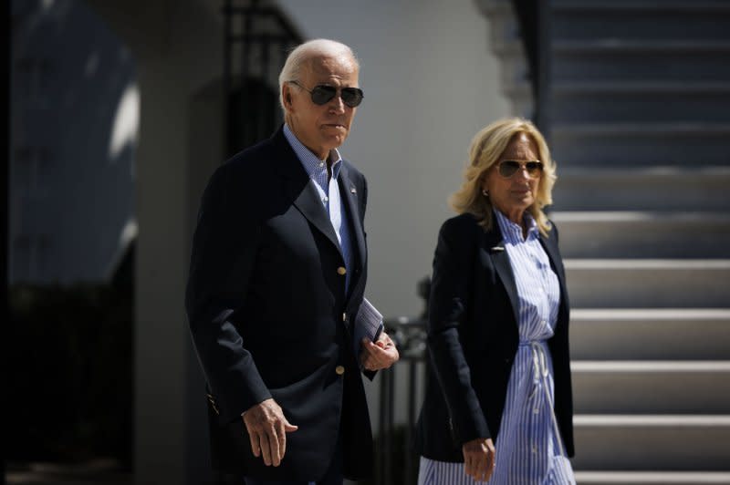President Joe Biden and first lady Jill Biden walk on the South Lawn of the White House on Saturday before traveling to Florida to survey damage caused by Hurricane Idalia and meet with residents impacted by the storm. Photo by Ting Shen/EPA-EFE/Pool