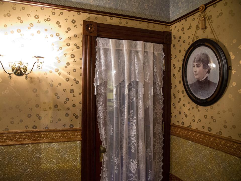 A portrait of Sarah Winchester inside the Winchester Mystery Home.