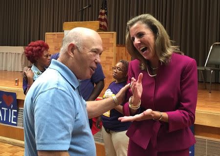 Katie McGinty, the Democratic nominee for Senate in Pennsylvania, speaks with a supporter at a rally, in Philadelphia, Pennsylvania, U.S., September 6, 2016. Picture taken September 6, 2016. REUTERS/Joseph Ax