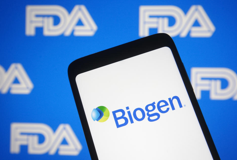 UKRAINE - 2021/06/07: In this photo illustration the Biogen logo of a biotechnology company is seen on a smartphone with a Food and Drug Administration (FDA or USFDA) logo in the background. The U.S. FDA approves Biogen Alzheimer's drug, reportedly by media. (Photo Illustration by Pavlo Gonchar/SOPA Images/LightRocket via Getty Images)