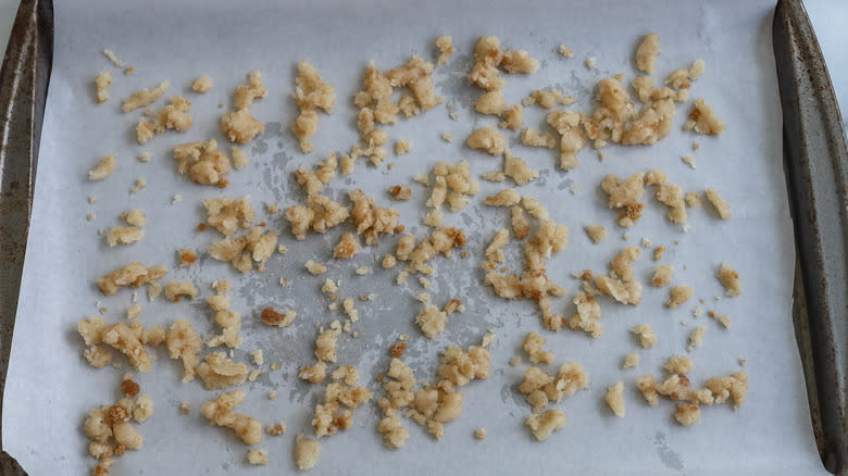 unbaked crumb topping on a baking sheet