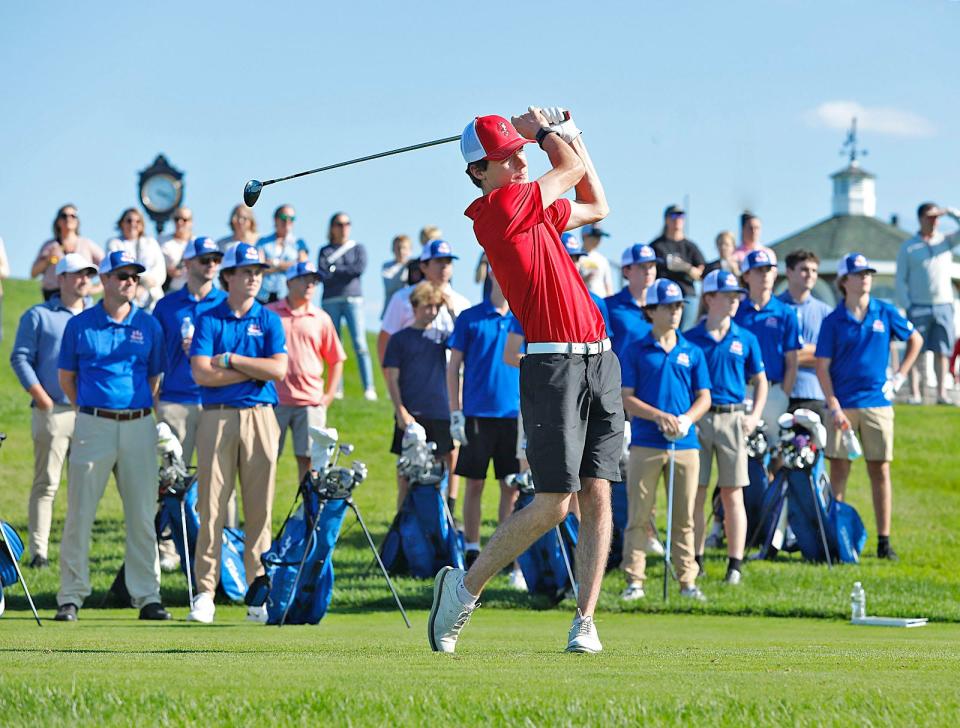 North Quincy Raider  John Toland trees off on the first hole.The annual Quincy High Schools golf match takes place at Granite Links on Wednesday, Sept. 20, 2023 