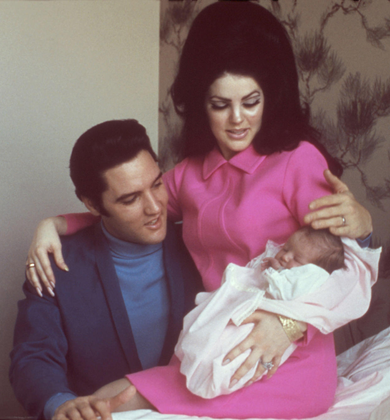 Elvis and Priscilla Presley cradled their newborn daughter, Lisa Marie, in February 1968. (Michael Ochs Archives / Getty Images)