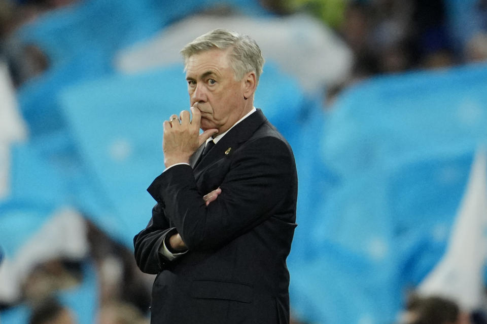 Real Madrid's head coach Carlo Ancelotti stands by the touchline during the last minutes of the Champions League semifinal second leg soccer match between Manchester City and Real Madrid at Etihad stadium in Manchester, England, Wednesday, May 17, 2023. Manchester City won 4-0. (AP Photo/Jon Super)