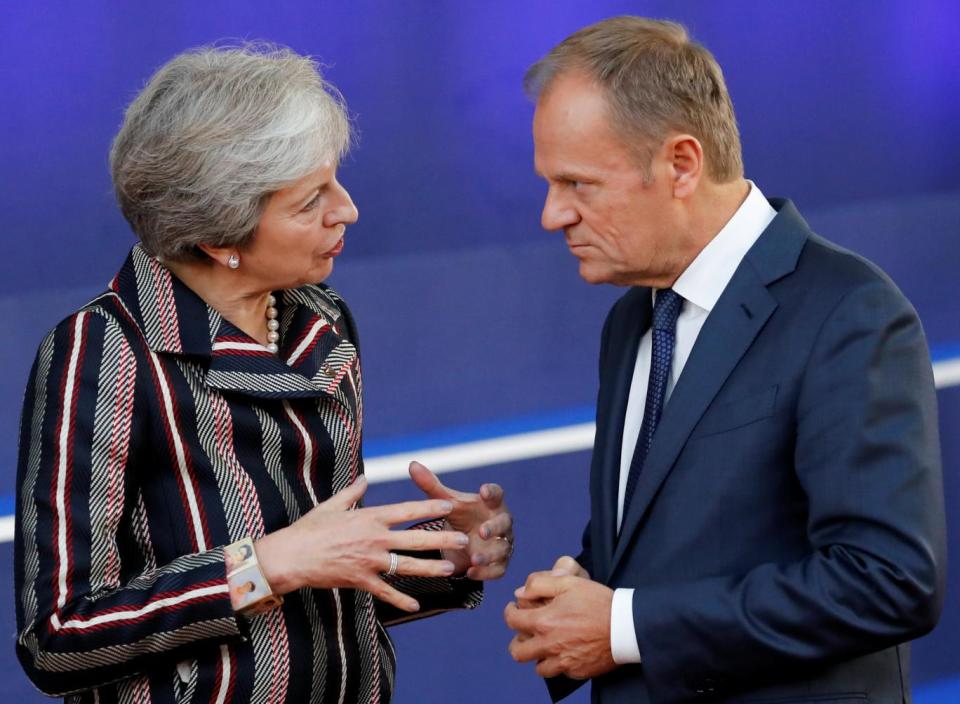 European Council President Donald Tusk and Britain's Prime Minister Theresa May talk (REUTERS)