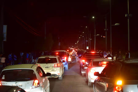 ars evacuate away from the coast after an earthquake in Coquimbo, Chile January 19, 2019. Picture taken January 19, 2019. REUTERS/Alejandro Pizarro